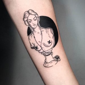 Татуировка на предплечье в виде портрета