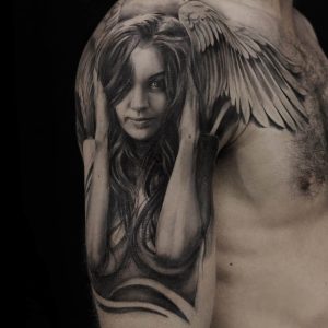 Татуировки с портретами на руке