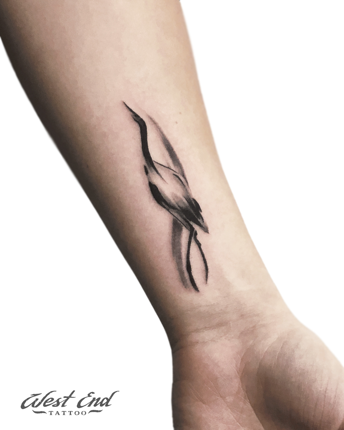 Татуировка аиста на руке