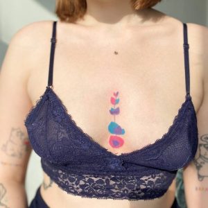 Цветное тату на груди